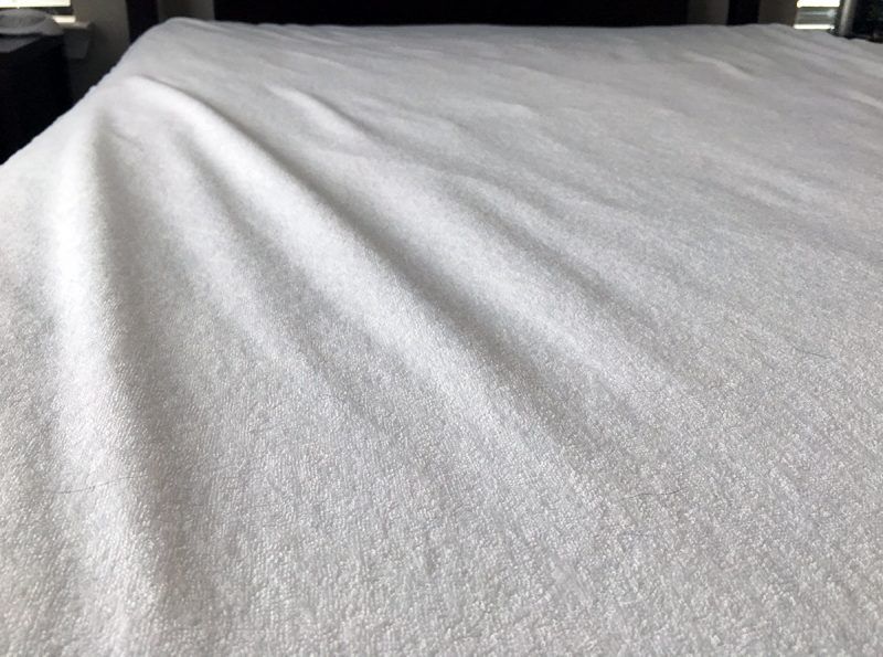 defend a bed mattress pad