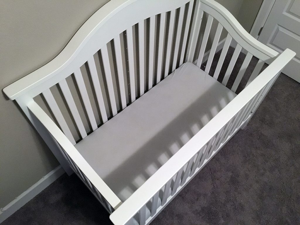 crib mattress level for newborn
