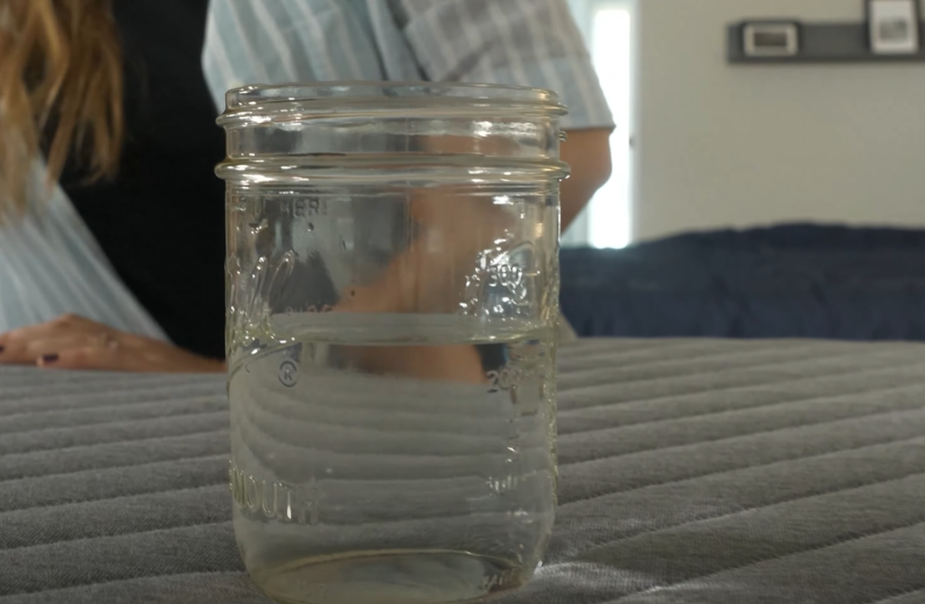 Using a mason jar full of water to test motion absorption on the Siena Original mattress