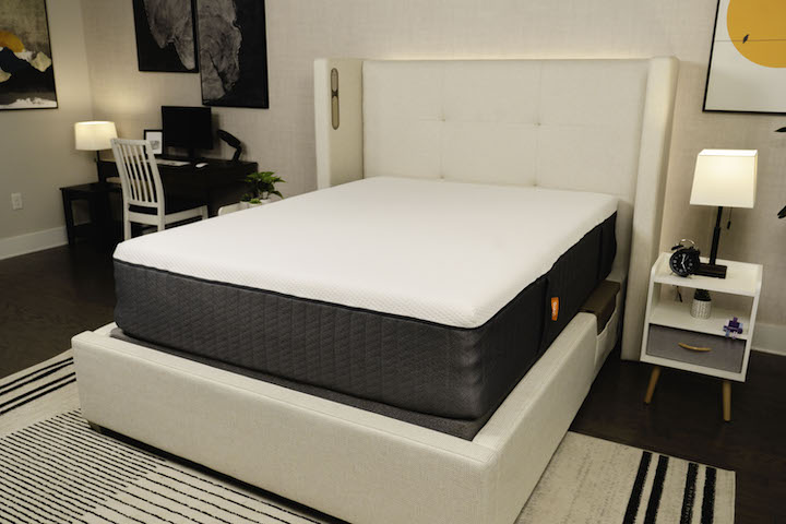 A picture of the Emma Hybrid Cooling Elite mattress on a bedframe.