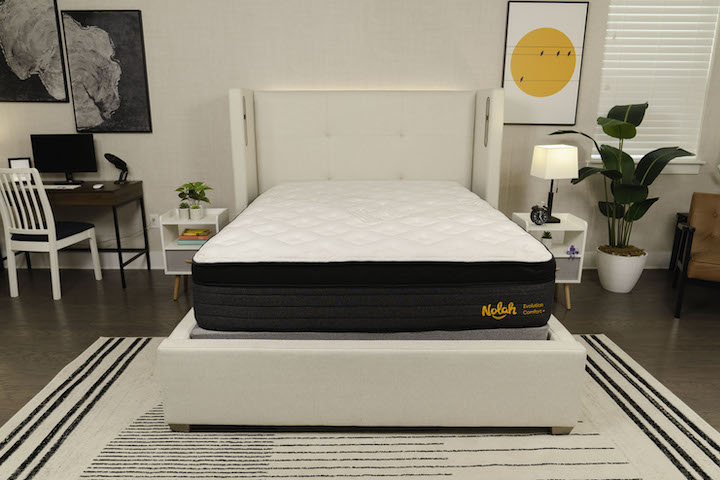 the Nolah Evolution Comfort + mattress sits on a bed frame