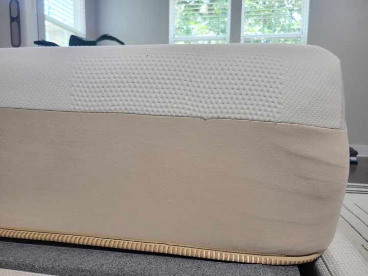 A side angle of the Saatva Contour5 to show how tall the bed is.