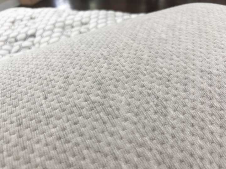 A close up image of the Bear Talalay Latex pillow's cover.